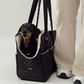 Cocopup Dog Carrier in Quilted Black.&nbsp;Combining ultimate comfort for your pup with effortless, chic functionality for you. Designed specifically for small dogs and puppies, this stylish tote-style carrier makes every outing easy.&nbsp;